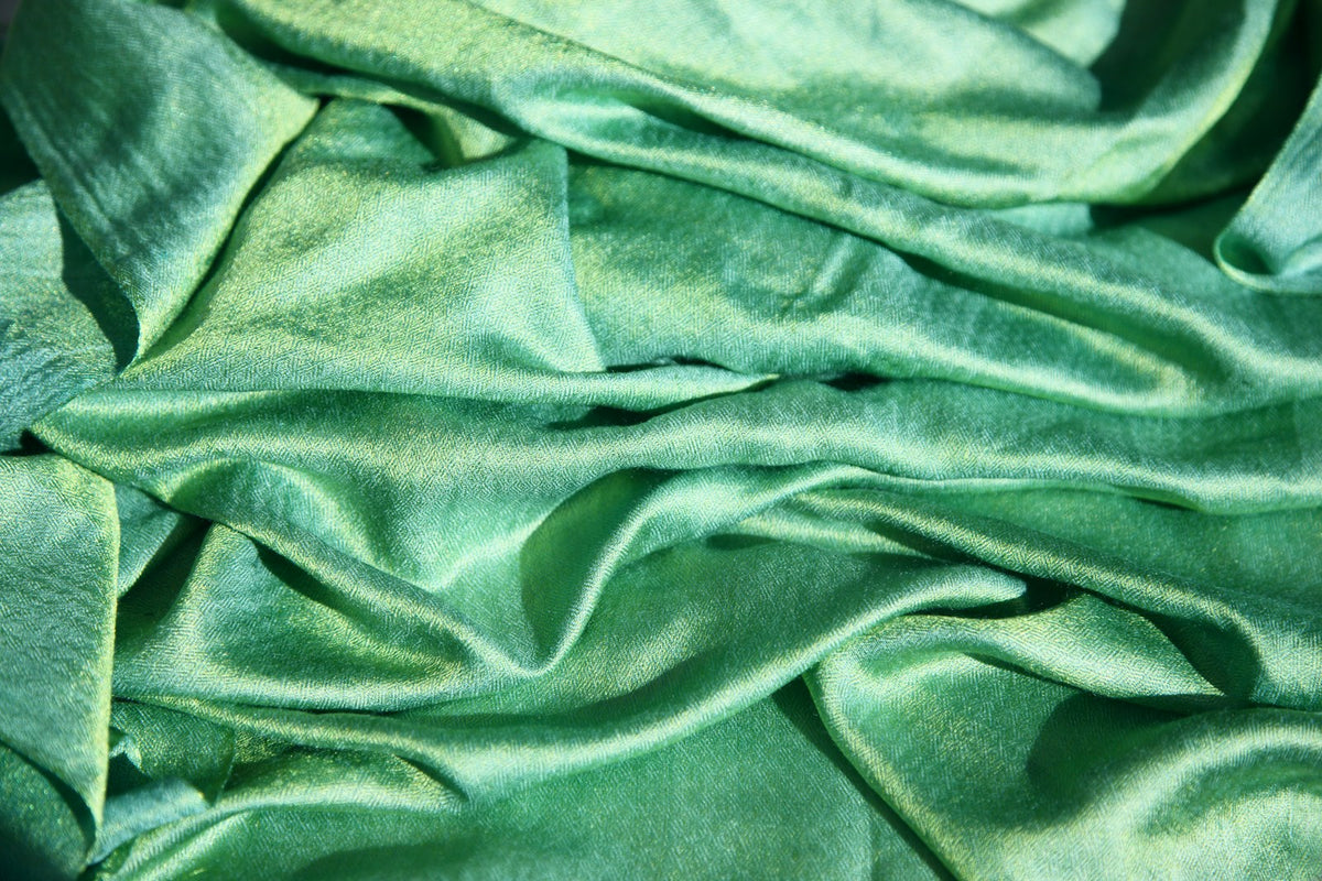 Folded emerald green silk vintage scarf